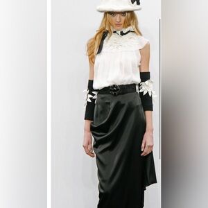 CHANEL Black and White Asymmetrical Skirt wanted to purchase in size FR38 or 36.